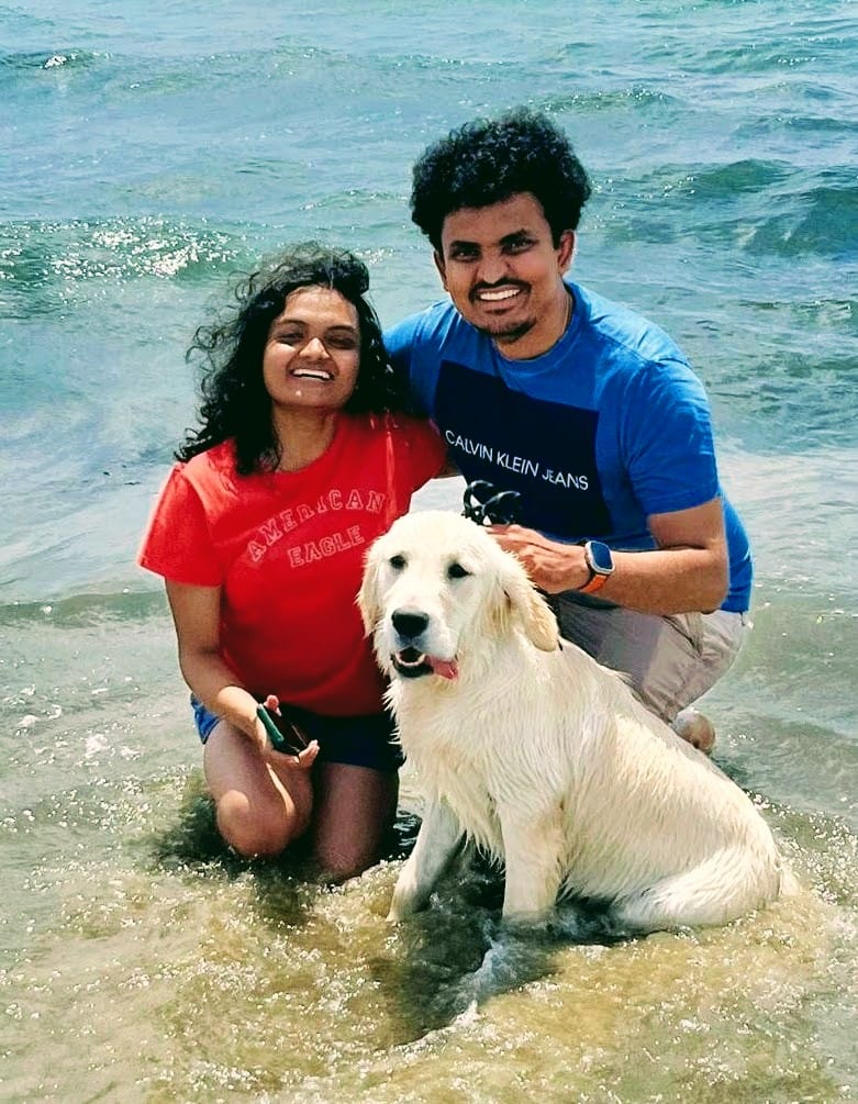 Karthik, his wife, Pranathi, and their dog, Asher, unwind with a day outdoors.